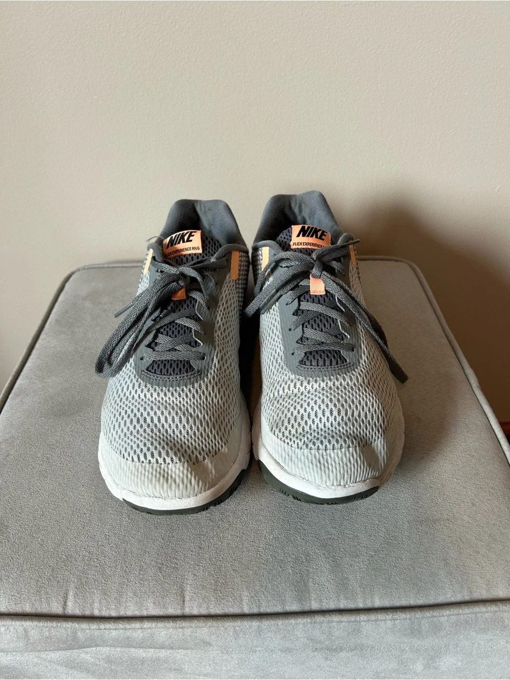 Nike women’s Gray & Black Mesh Sneakers with Orange Accents